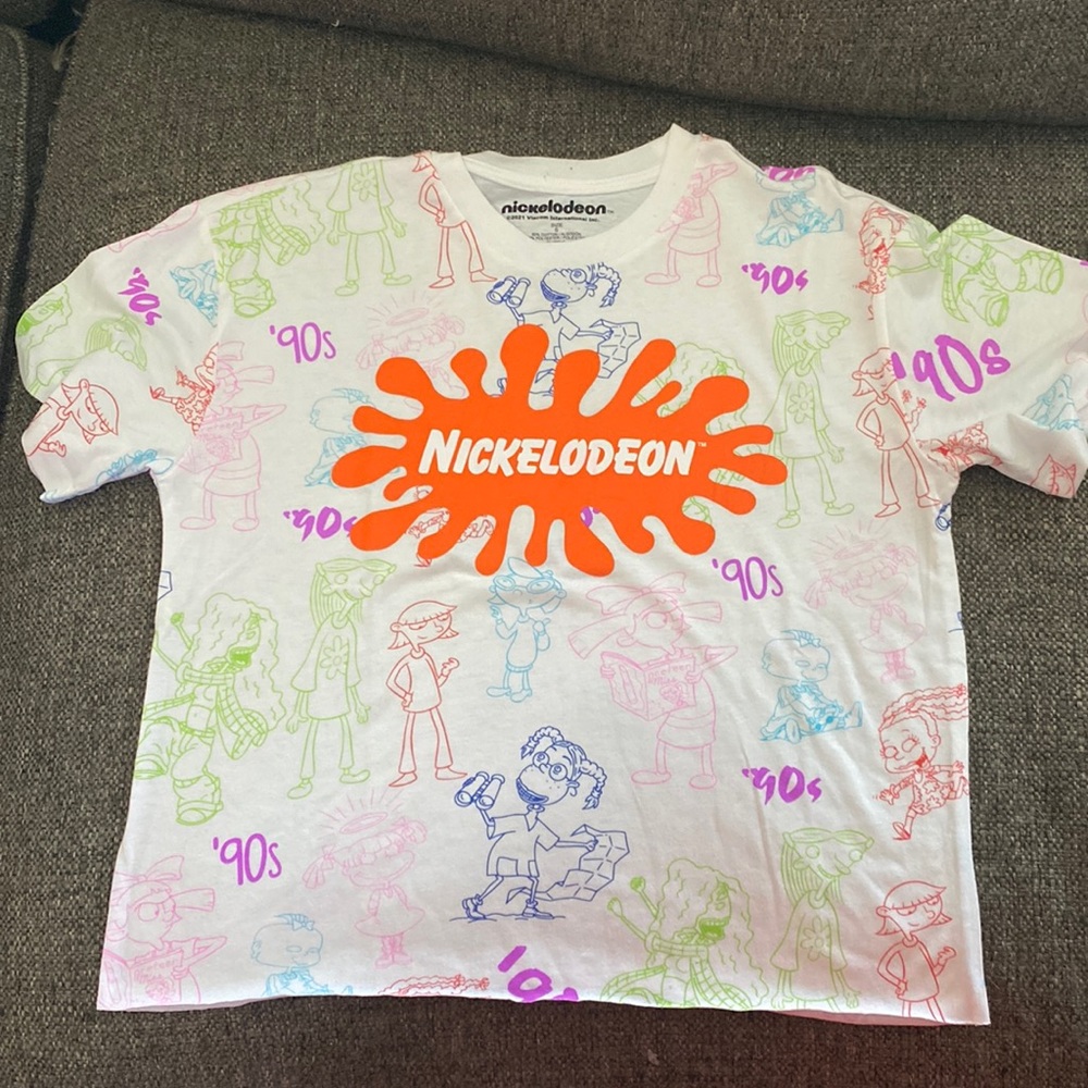 white shirt with ‘older’ nickelodeon cartoon designs